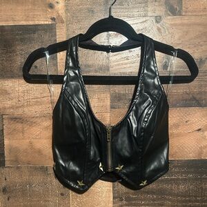 Black Faux Leather Vest with Gold star Studs fits more like a small